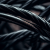 Чорні металеві кабелі без електричної ізоляції